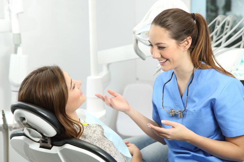 person attending dental implant consultation 
