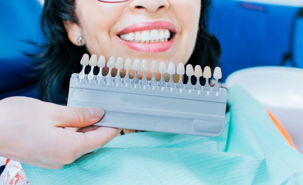 A woman undergoing a cosmetic dentistry procedure.