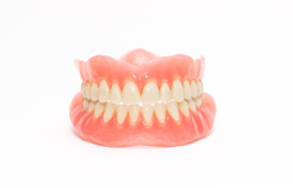 Picture of a pair of dentures on a white background